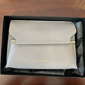 Brand new Strathberry Stylist bag w/ box, care instructions and dust bag.